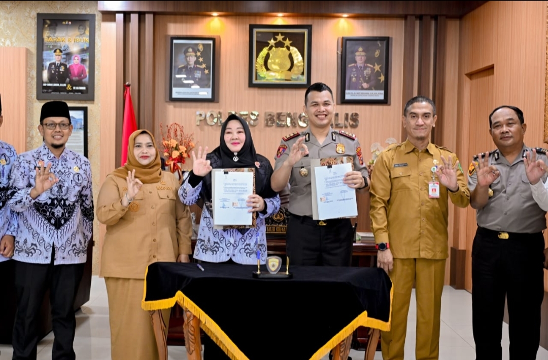 Disaksikan Bupati dan Kadisdik, PGRI–Polres Bengkalis Teken MoU Perlindungan Hukum Guru dan Tenaga Kependidikan